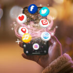 hand-holding-smartphone-social-media-concept (1)