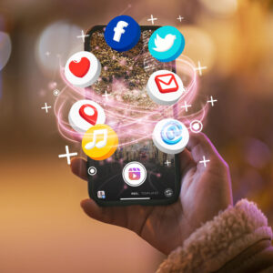 hand-holding-smartphone-social-media-concept (1)